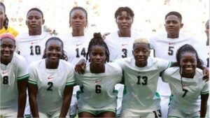 The Super Falcons of Nigeria return to the pitch with 25 players against Algeria but are missing big names such as Plumptre and Oshoala.
