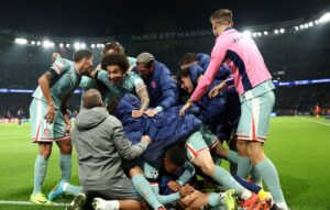 Atletico Madrid celebrate their stoppage time winner.