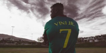 Ngannou poses in Vinicius’ Cameroon jersey
