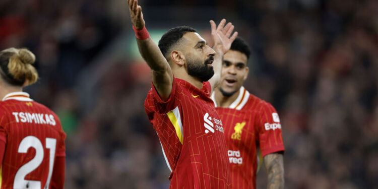 Liverpool's Mohamed Salah celebrates scoring their side's second goal of the game during the Premier League match at Anfield, Liverpool. Picture date: Saturday November 2, 2024. PA Photo. See PA story SOCCER Liverpool. Photo credit should read: Nigel French/PA Wire.

RESTRICTIONS: EDITORIAL USE ONLY No use with unauthorised audio, video, data, fixture lists, club/league logos or "live" services. Online in-match use limited to 120 images, no video emulation. No use in betting, games or single club/league/player publications.