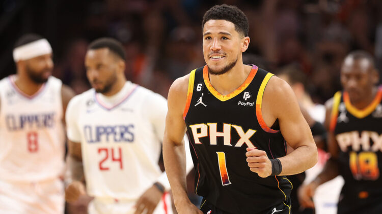 PHOENIX, ARIZONA - APRIL 25: Devin Booker #1 of the Phoenix Suns reacts during the second quarter against the LA Clippers in game five of the Western Conference First Round Playoffs at Footprint Center on April 25, 2023 in Phoenix, Arizona. NOTE TO USER: User expressly acknowledges and agrees that, by downloading and or using this photograph, User is consenting to the terms and conditions of the Getty Images License Agreement. (Photo by Christian Petersen/Getty Images)