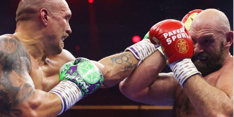 In a rematch in Saudi Arabia, Oleksandr Usyk defeats Tyson Fury to retain the undisputed heavyweight title.