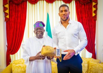 Joshua visits Tinubu, presents him with autographed boxing glove