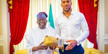 Joshua visits Tinubu, presents him with autographed boxing glove