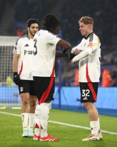 Fulham's Alex Iwobi and Calvin Bassey 