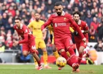 Liverpool edges past Wolves to extend Premier League lead