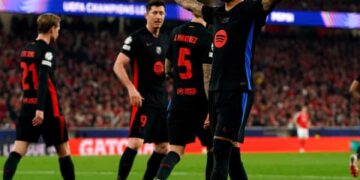 Barcelona triumphs over Benfica despite early red card