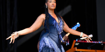 Tems shown in iconic photo posing with NBA Trophy ahead of 2025 Playoffs