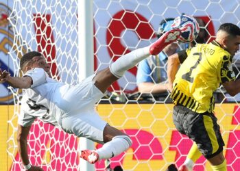 Madrid survive late Dortmund revival to book last four spot