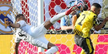 Madrid survive late Dortmund revival to book last four spot