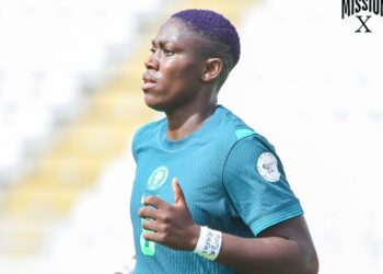 Oshoala wears tribute hand band for Peter Rufai