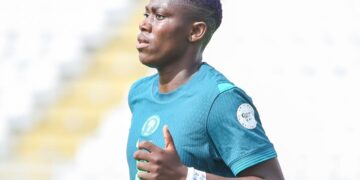 Oshoala wears tribute hand band for Peter Rufai