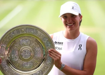Świątek makes history with ruthless win to claim first Wimbledon title