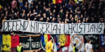 Romanian fans display “Defend Nigerian Christians” banner during World Cup Qualifier