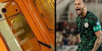 Super Eagles captain Ekong shows off customized gold-plated iPhone 17