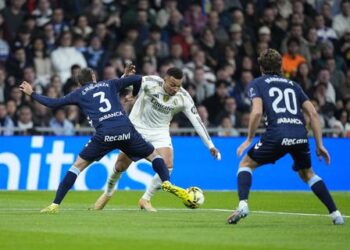 Barcelona four points clear as Celta Vigo stun Madrid in Bernabeu