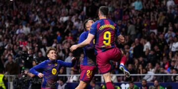 Lewandowski grabs late winner as Barca edge Atleti to open a seven-point gap over Madrid.