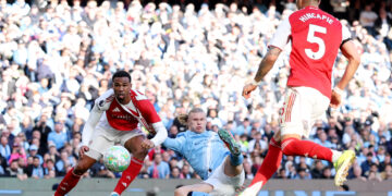 Arsenal’s title hopes fade as Haaland, Cherki power City to victory at the Etihad